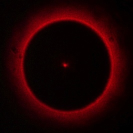Arago's spot with imaging lens